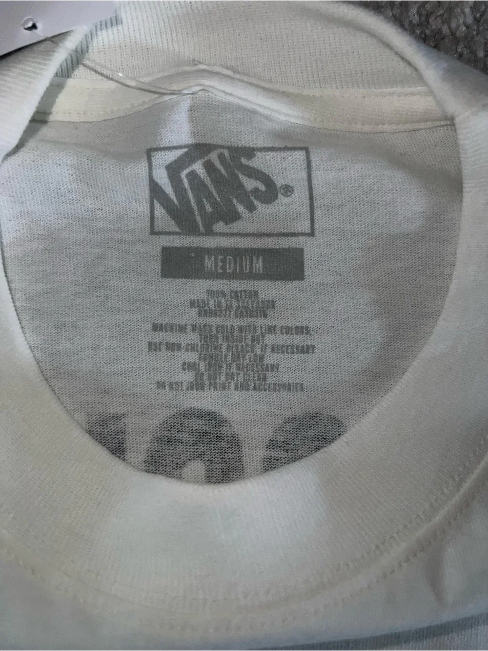 Vans White Wall Art with Black Text and Multicolor Keypad